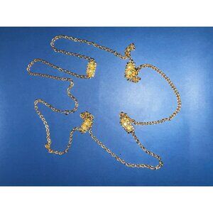 Long 26" gold tone rope necklace w square charms has faux diamonds
